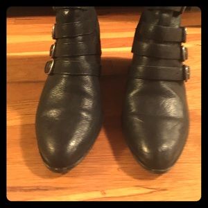 Black booties with buckles